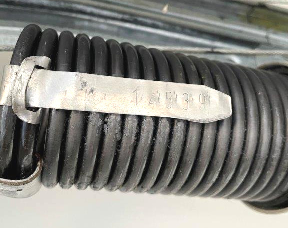 Label on a garage door spring